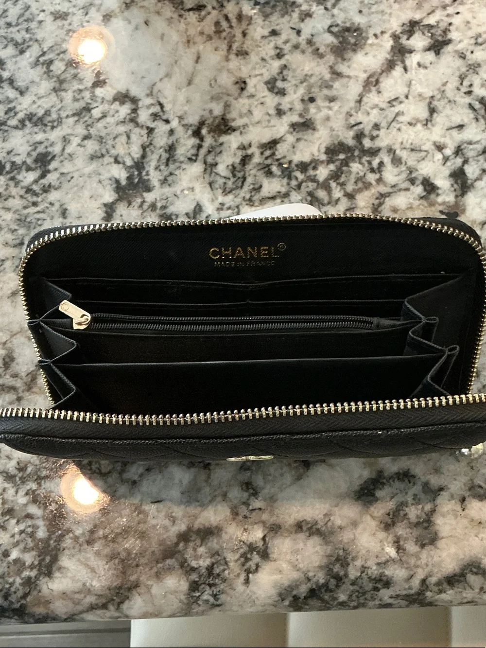CHANEL Black Quilted Zip-Around Wallet with Gold CC Hardware